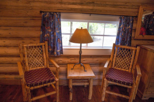 Table and chairs near a window in Dining Cabin 2 | Best Dude Ranches in Wyoming | CM Ranch