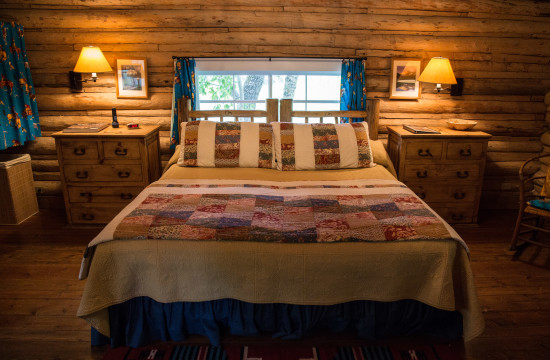 Queen bedroom in Dining Cabin 5 | Family Dude Ranch Vacations | CM Ranch