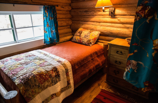 Twin bedroom in Dining Cabin 5 | Family Dude Ranch Vacations | CM Ranch