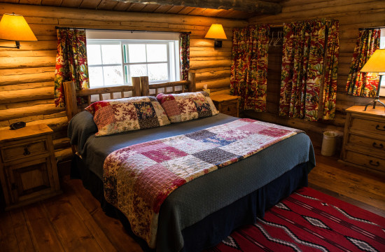 The queen bedroom at Dining Cabin 6 | Dubois Wyoming Lodging | CM Ranch