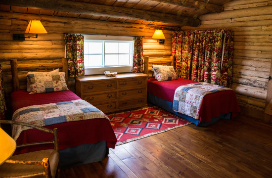 The twin bedroom at Dining Cabin 6 | Dubois Wyoming Lodging | CM Ranch