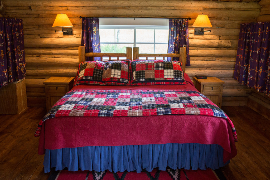 Queen bedroom in Hill Cabin 1 | Wyoming Guest Ranch | CM Ranch