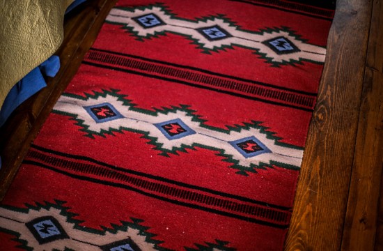 Authentic western blanket in Dining Cabin 2 | Best Dude Ranches in Wyoming | CM Ranch