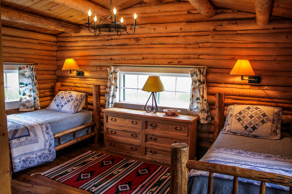 Twin bedroom of Hill Cabin 2 | Affordable dude ranch vacations | CM Ranch