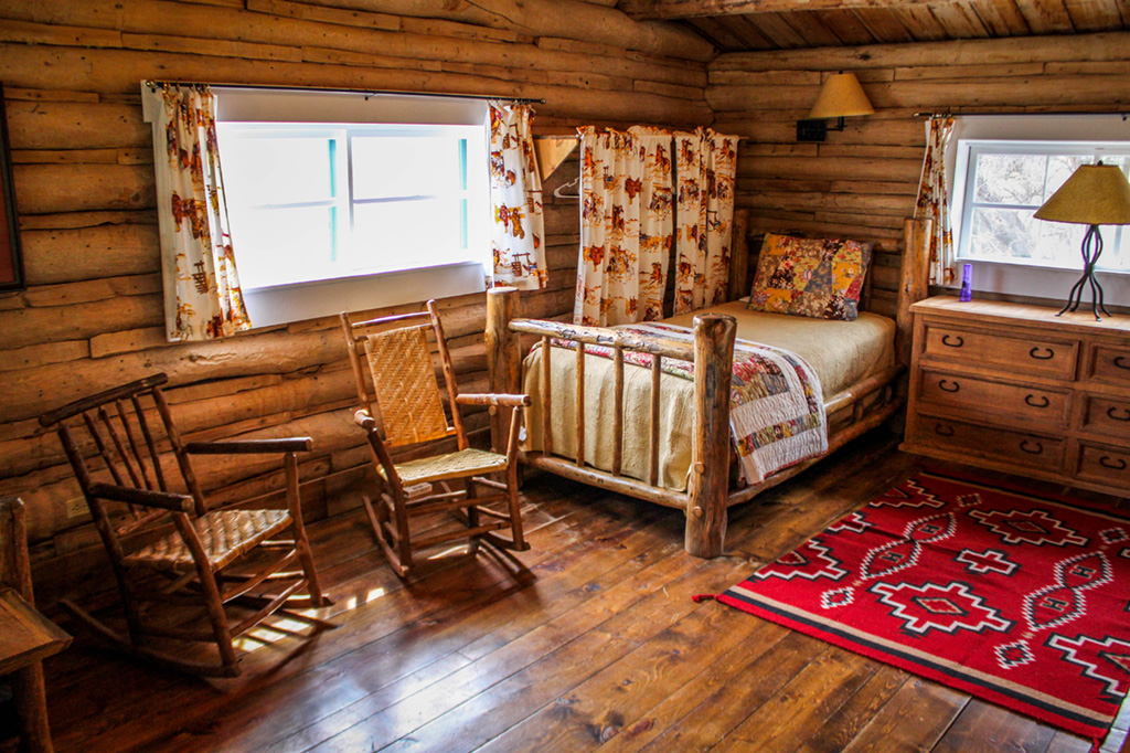 In the Twin Bedroom in Hill Cabin 3 | Wyoming Dude Ranches for Families | CM Ranch