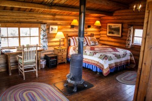 Studio Cabin Bedroom | Horseback riding vacation packages at CM Ranch