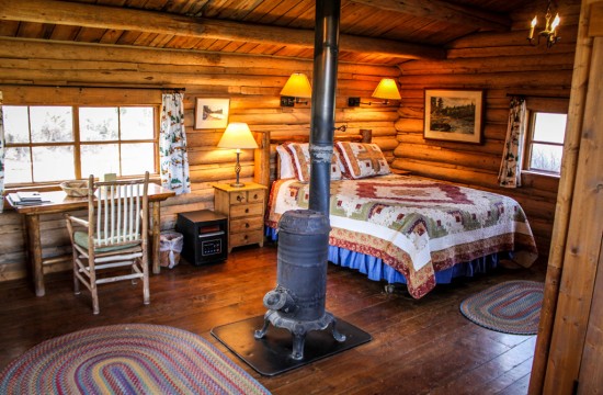Studio Cabin Bedroom | Horseback riding vacation packages at CM Ranch