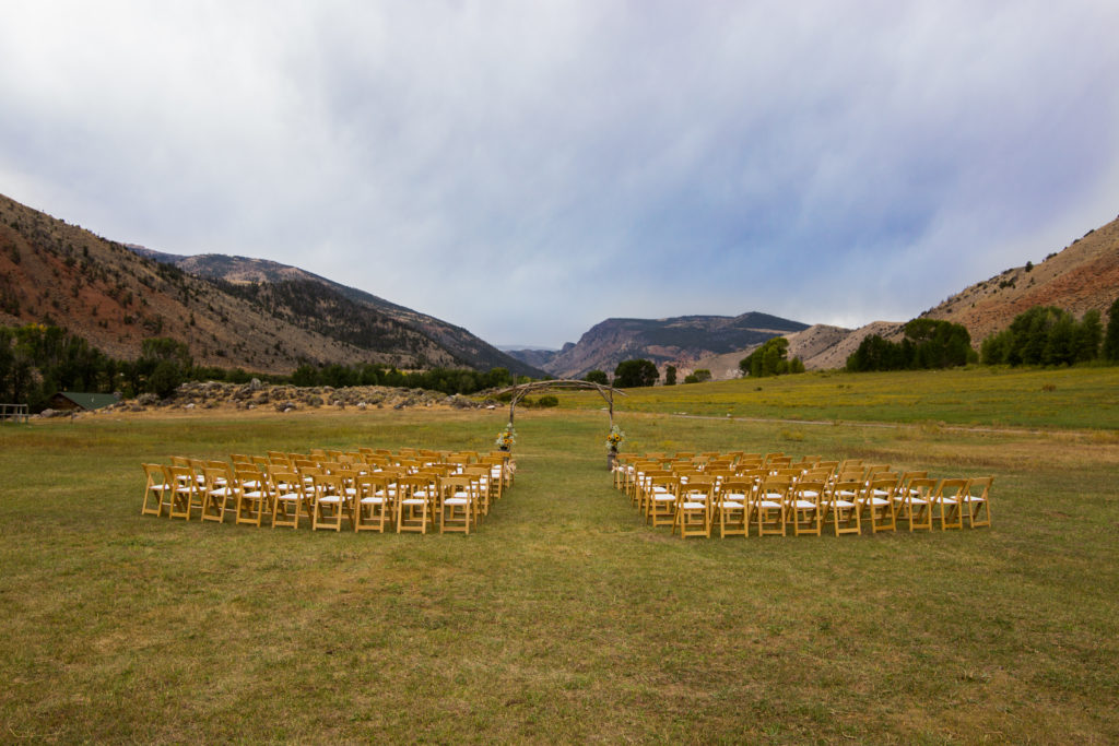 Chairs set up in a field for a wedding ceremony at CM Ranch in Dubois WY | dude ranch Jackson Hoe