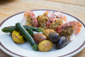 A plated dinner of country-fried shrimp, potatoes and zucchini at CM Ranch in Dubois, WY | Wyoming dude ranches for families