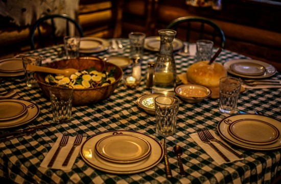 A table set for dinner with salad and bread at CM Ranch in Dubois, WY | Wyoming dude ranches for families